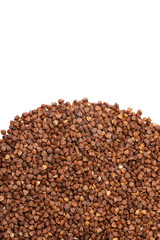 raw buckwheat groats on a white background