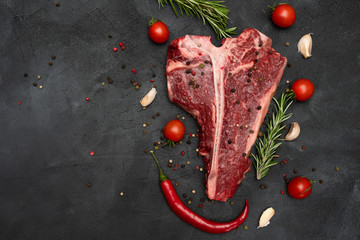 T-bone or Porterhouse on a black background. 