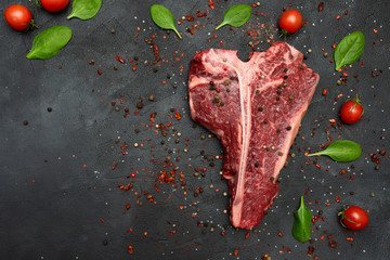 T-bone or Porterhouse on a black background. 