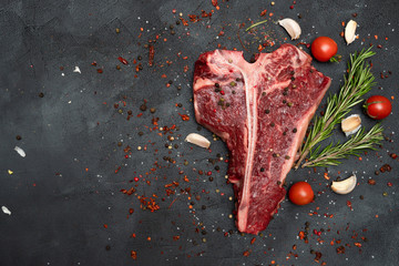 T-bone or Porterhouse on a black background. 