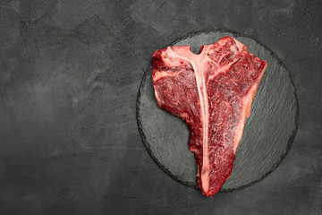 T-bone or Porterhouse on a black background. 