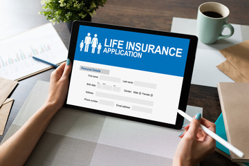 Life insurance online application form on device screen.