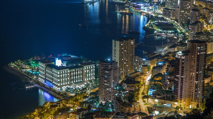 Fototapeta na wymiar Aerial top view of Monaco from the grand corniche road night timelapse, Monaco France