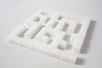 high key Detail of a maze made of sugar cubes, symbolizing unhealthy eating habits