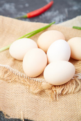 A pile of fresh raw eggs
