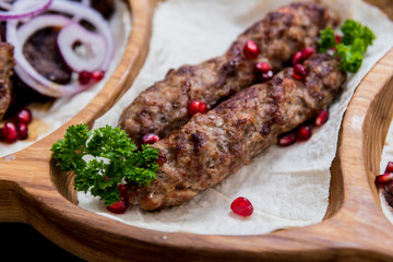 Georgian cuisine food. Grilled meat with khinkali. Georgian restaurant.
