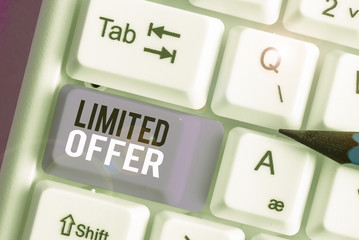 Writing note showing Limited Offer. Business concept for special item available for a defined short...