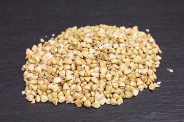 heap of dried sprouted buckwheat grains