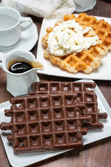 Tasty Belgian dessert, Brussels waffles with chocolade and whipped cream