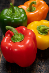 Fresh red, orange, green and yellow sweet bell paprika