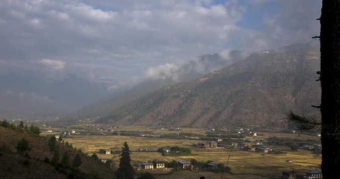 The Thimphu valley at the kingdom of Bhutan, Himalaya. A time lapse video Taken around the Punakha Dzong Monastery in Bhutan. Epic landscape in the early morning shortly after sunrise
