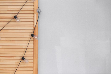 vintage light bulbs on a tambour door