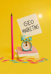Writing note showing Geo Marketing. Business concept for the geolocated marketing techniques to get...