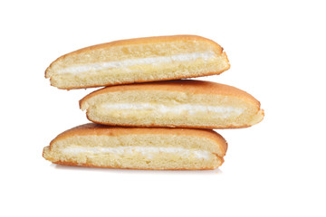 stack of three slices vanilla sponge cake with cream filling
