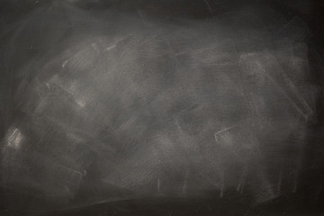 Abstract texture of chalk rubbed out on blackboard or chalkboard , concept for education, banner, startup, teaching , etc.