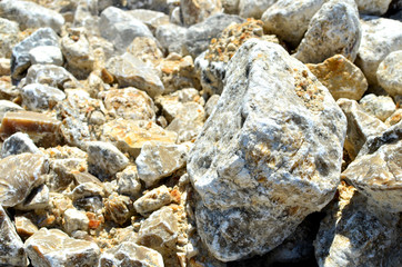 Natural gray gypsum stone. Close up image of stones with black and white. Industrial mining area. Limestone mining, quarry - Image