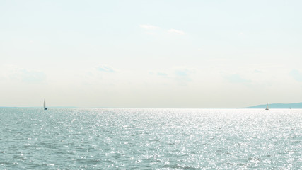 View of the sparkling sun on the surface of the Balaton.