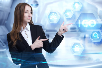 Business, Technology, Internet and network concept. Young businessman working on a virtual screen of the future and sees the inscription: ICO