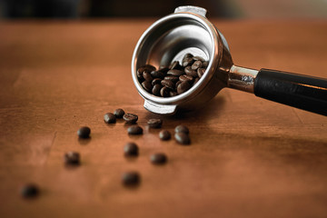 focus on filter holder for espresso coffee machine, close up side view photo.recipe of good strong...