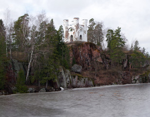 Spring view of the Monrepos Park, Vyborg, Leningrad Region, Russia. Beatiful spring landscape, a castle on a rock.
