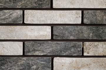 wall of dark and light bricks