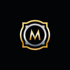 M Luxury round shape gold and silver logo