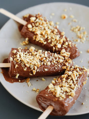 Chocolate ice cream with nuts. Raw desserts	