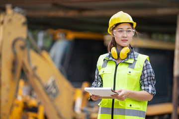 A asian girl construction engineer at construction site 