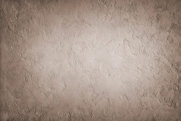Grey-brown texture decorative background Venetian stucco for backgrounds shaded around the edge