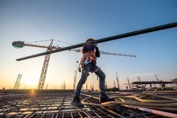 Foto op Plexiglas A construction worker at construction site © bannafarsai