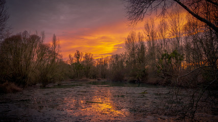 Sunset over a flood area after a storm