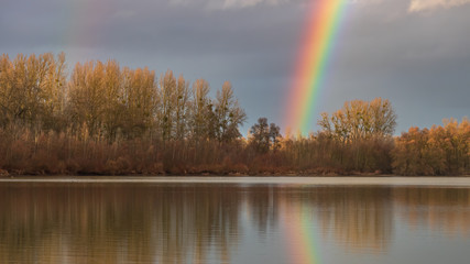 Rainbow over the lake Wörthfeldsee