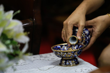pour ceremonial and pray for dead people.