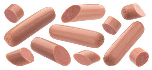 Whole and sliced boiled sausages isolated on white background