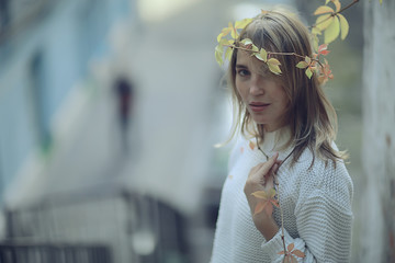 happy woman in autumn look, young girl outside in autumn mood