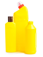 Bottles of detergents on white background