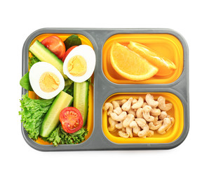 School lunch box with tasty food on white background