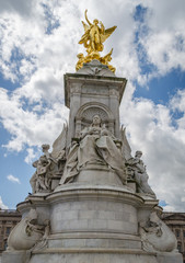 Fototapeta na wymiar Queen Victorial Memorial statue in front of Buckhingham Palace in London United Kingdom UK