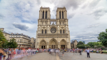 Fototapeta na wymiar Front view of Notre-Dame de Paris timelapse , a medieval Catholic cathedral on the Cite Island in Paris, France