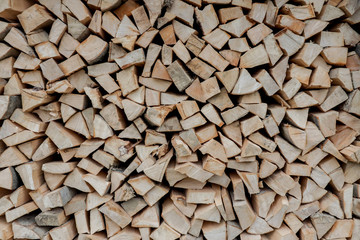 Stacks of Firewood. Preparation of firewood for the winter. Pile of Firewood.Firewood background