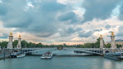Fototapeta premium Bridge of Alexandre III spanning the river Seine timelapse. Paris. France.