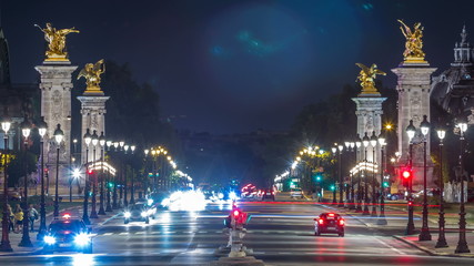 View of Avenue du Marechal Gallieni with traffic night timelapse. Paris, France