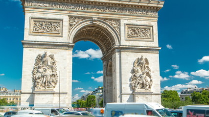 Obraz premium The Arc de Triomphe Triumphal Arch of the Star timelapse is one of the most famous monuments in Paris