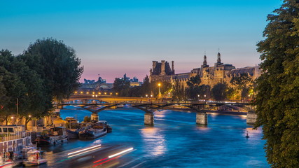 View on Pont des Arts in Paris after sunset day to night timelapse, France