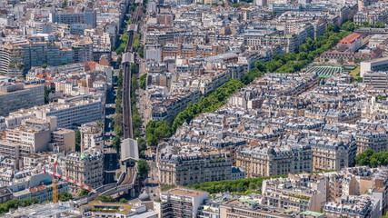Obraz premium Top view of Paris skyline from observation deck of Montparnasse tower timelapse. Main landmarks of european megapolis. Paris, France