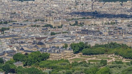 Obraz premium Top view of Paris skyline from observation deck of Montparnasse tower timelapse. Main landmarks of european megapolis. Paris, France