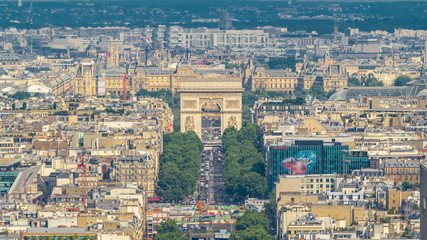 Aerial view of Paris and The Arc de Triomphe with Champs Elysees timelapse from the top of the...