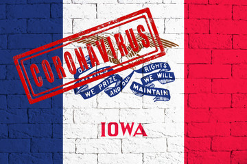 Flag of the State of Iowa painted on grungy wall background