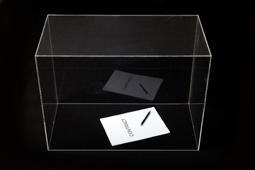 Contract and pen lie in transparent box