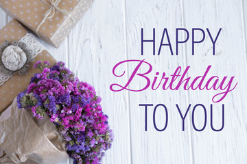 Happy Birthday to You. Greeting card with gift box on a white wooden background. Birthday Greeting Card for E-mail Newsletter